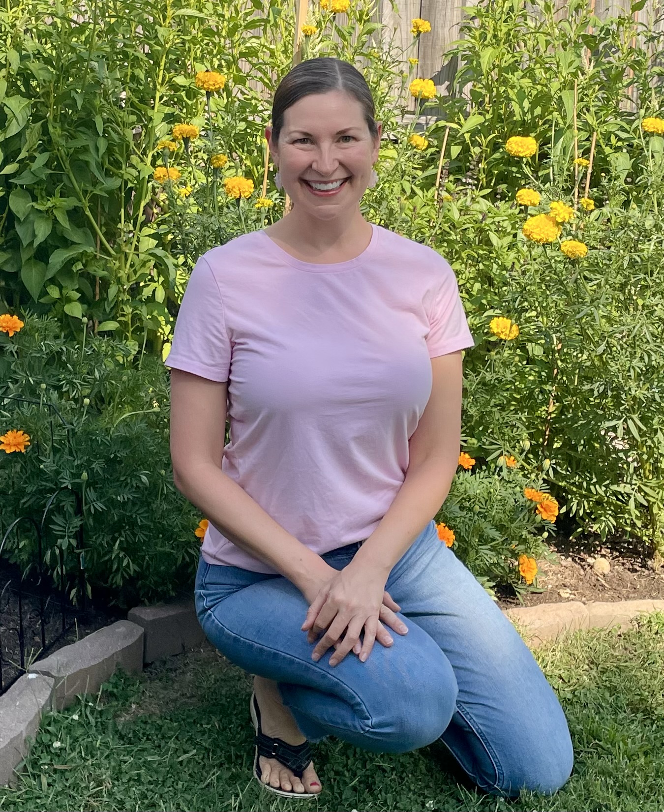 Heather Cremeens, owner of Serenity Blooms, in her backyard garden